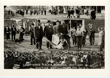 W56, Sherif Greer & Alois Slepicka settling election bet in Wilber, NE Nov.9, 1912 - Martin Photo